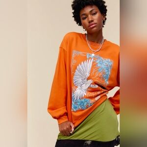 Daydreamer Orange Sweatshirt with White Dove and Light Blue Floral Print